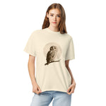 Owl and full moon design on an Ivory garment-dyed cotton t-shirt
