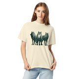Wolf silhouettes and moonlit forest design on an Ivory garment-dyed cotton t-shirt