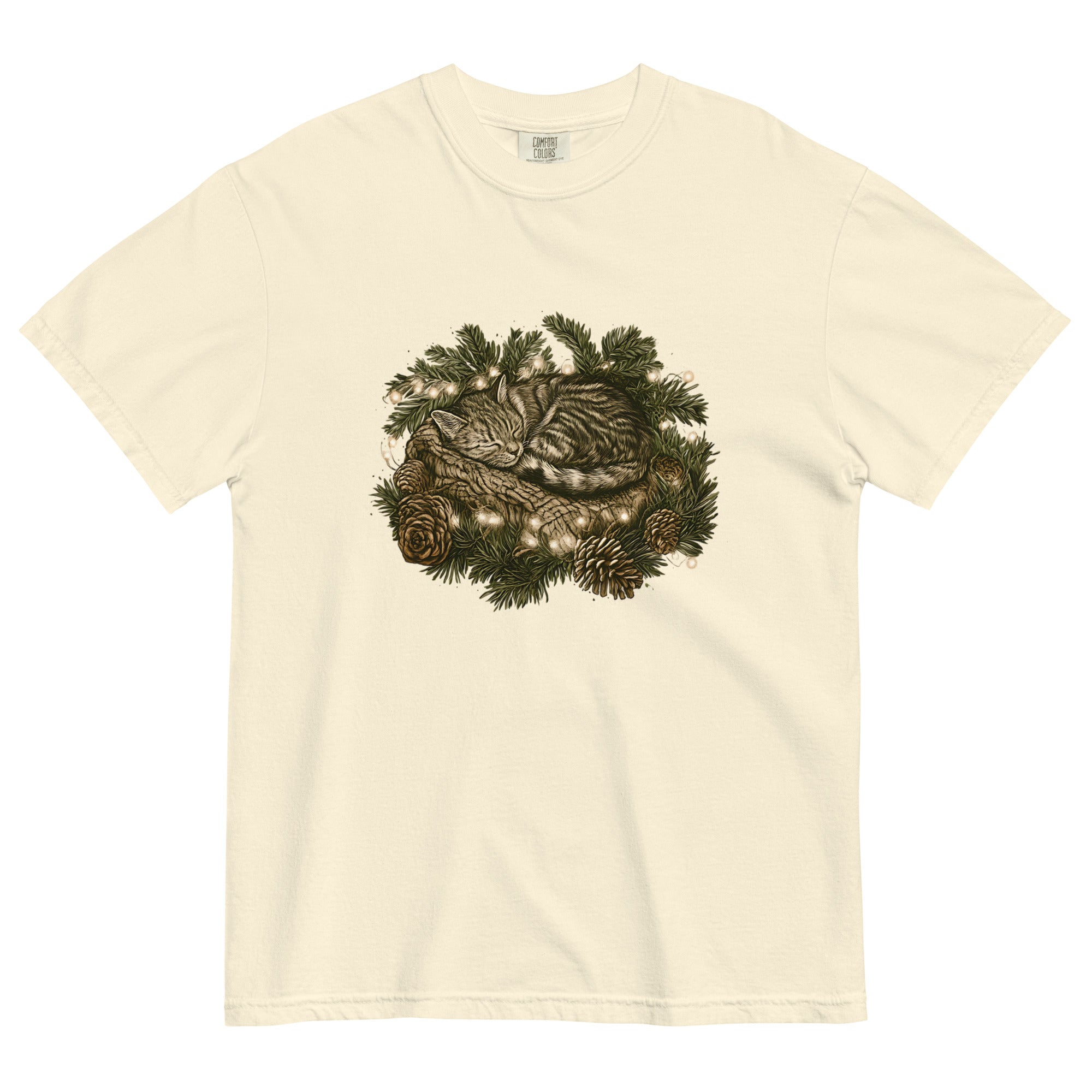 Kitten asleep in a Christmas wreath design on an Ivory garment-dyed cotton t-shirt