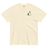 Snowman and pine tree design on an Ivory garment-dyed cotton t-shirt