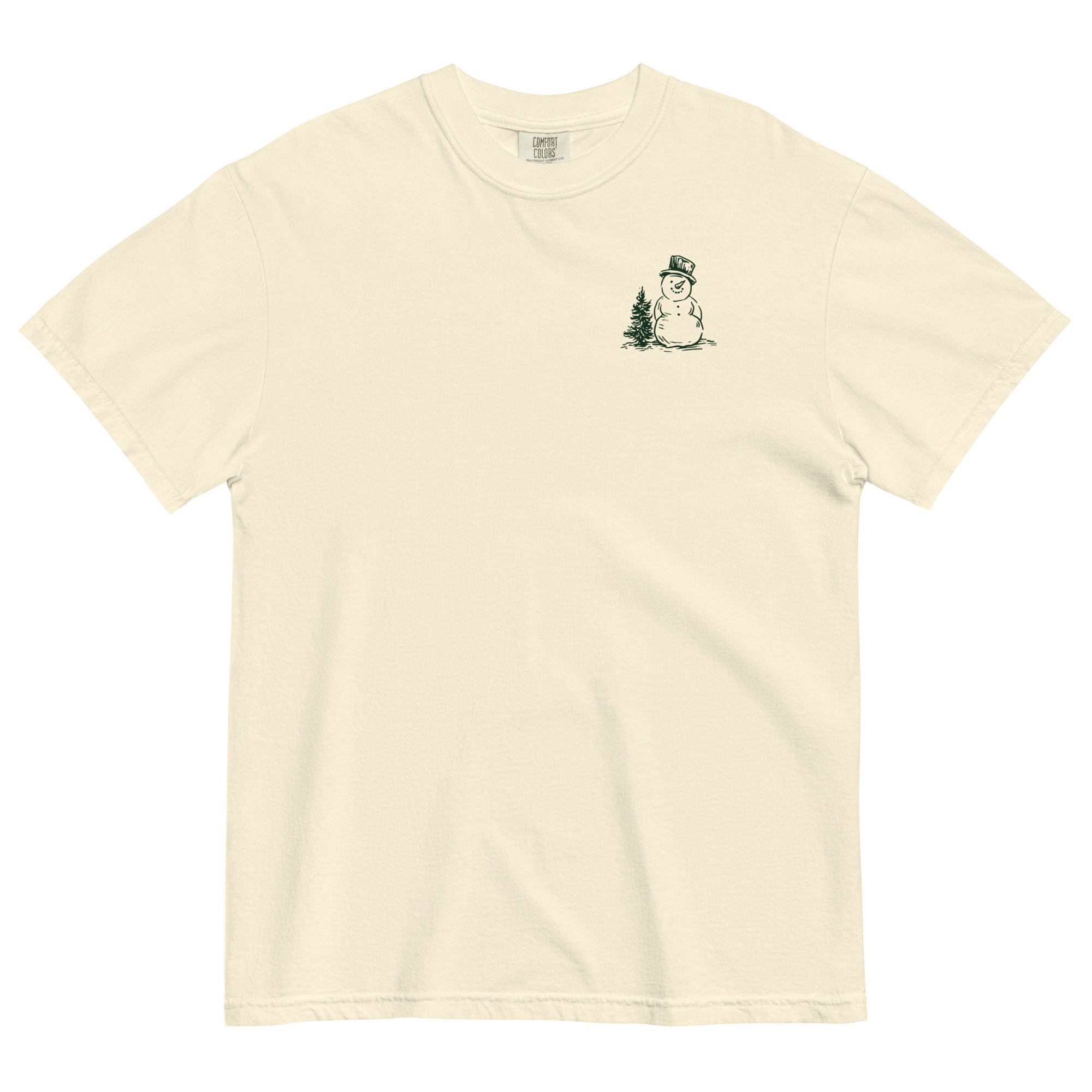 Snowman and pine tree design on an Ivory garment-dyed cotton t-shirt