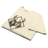 Stag and pines diamond emblem design on an Ivory garment-dyed cotton t-shirt