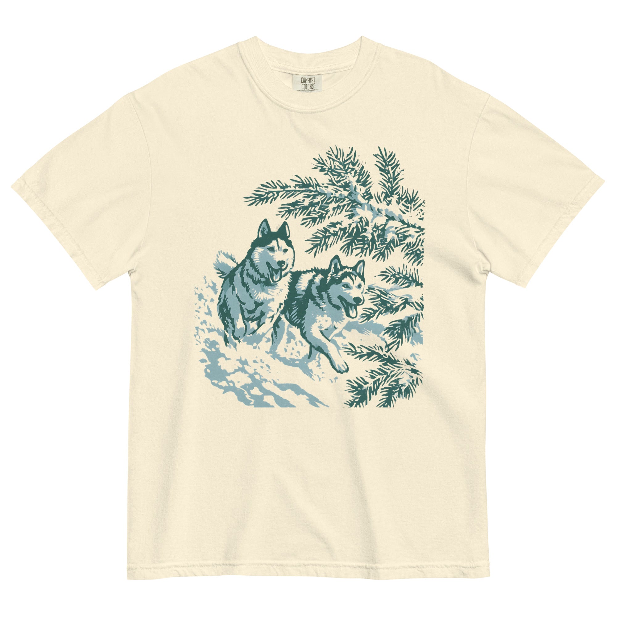 Huskies running in the snow design on an Ivory garment-dyed cotton t-shirt