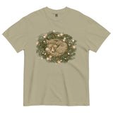 Fox asleep in a Christmas wreath design on a Khaki garment-dyed cotton t-shirt