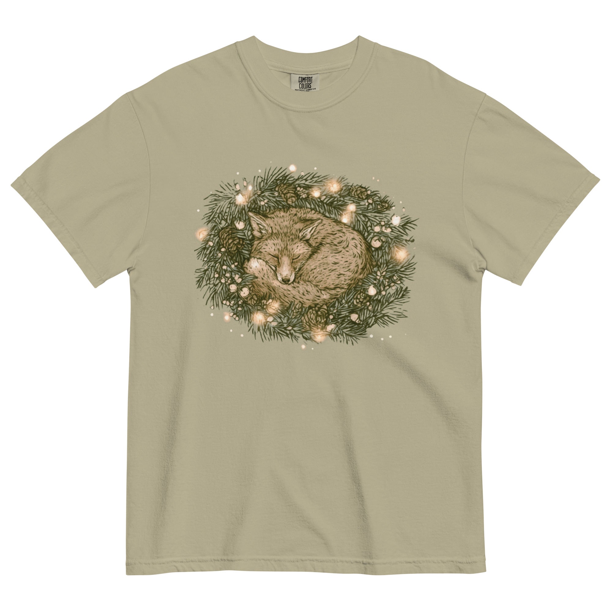 Fox asleep in a Christmas wreath design on a Khaki garment-dyed cotton t-shirt