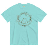 Frog in a holly wreath design on a Lagoon Blue garment-dyed cotton t-shirt