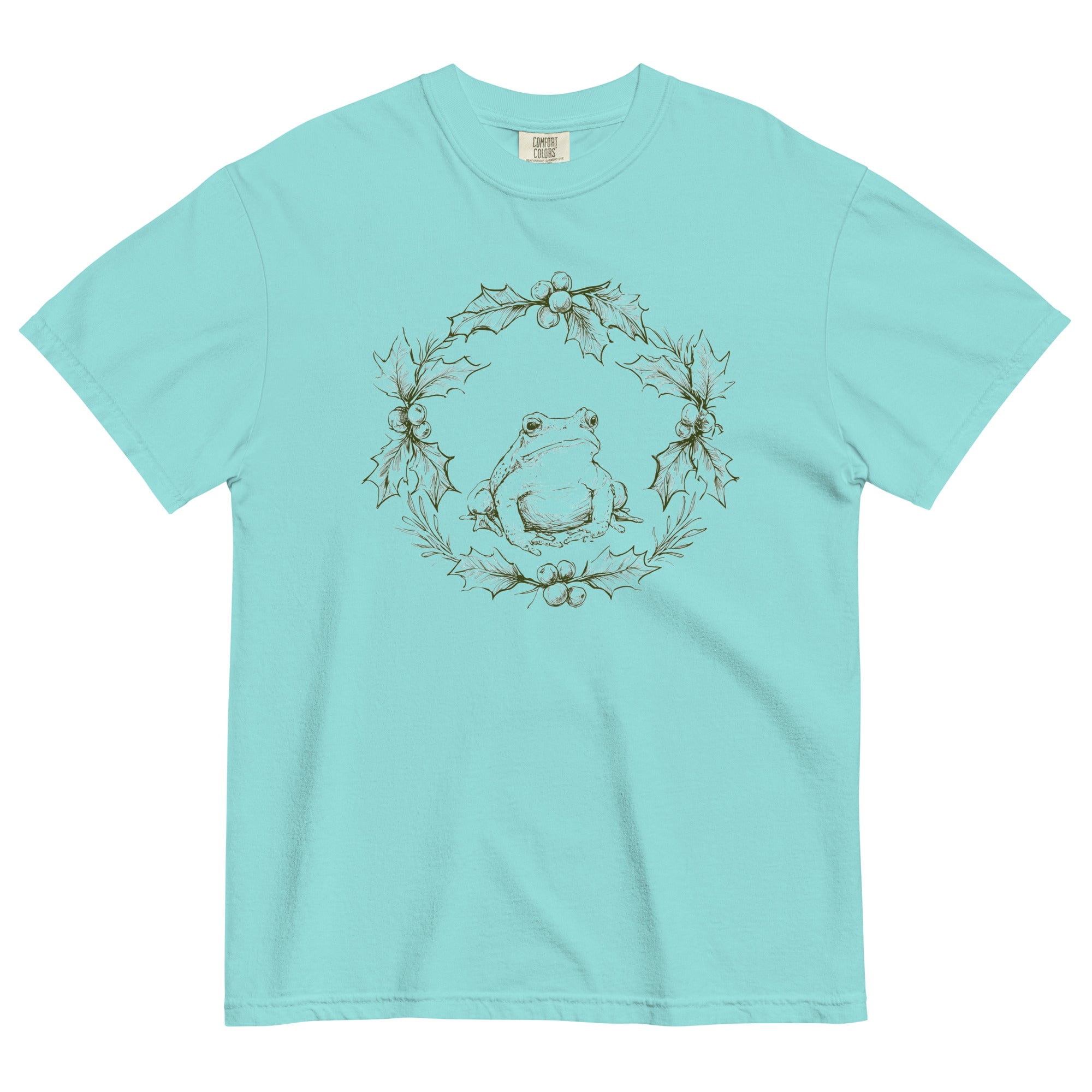 Frog in a holly wreath design on a Lagoon Blue garment-dyed cotton t-shirt
