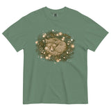 Fox asleep in a Christmas wreath design on a Light Green garment-dyed cotton t-shirt
