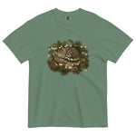 Kitten asleep in a Christmas wreath design on a Light Green garment-dyed cotton t-shirt