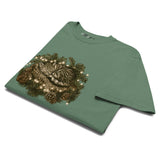 Kitten asleep in a Christmas wreath design on a Light Green garment-dyed cotton t-shirt