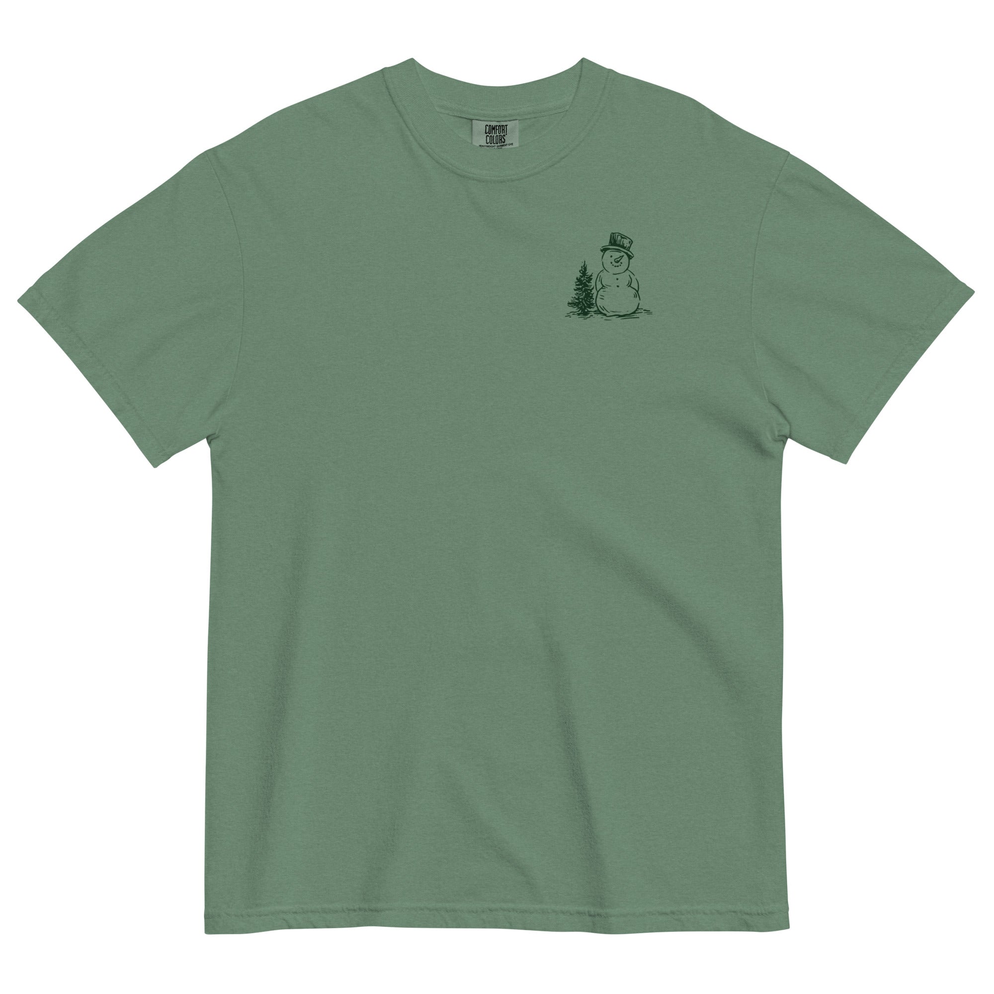 Snowman and pine tree design on a Light Green garment-dyed cotton t-shirt