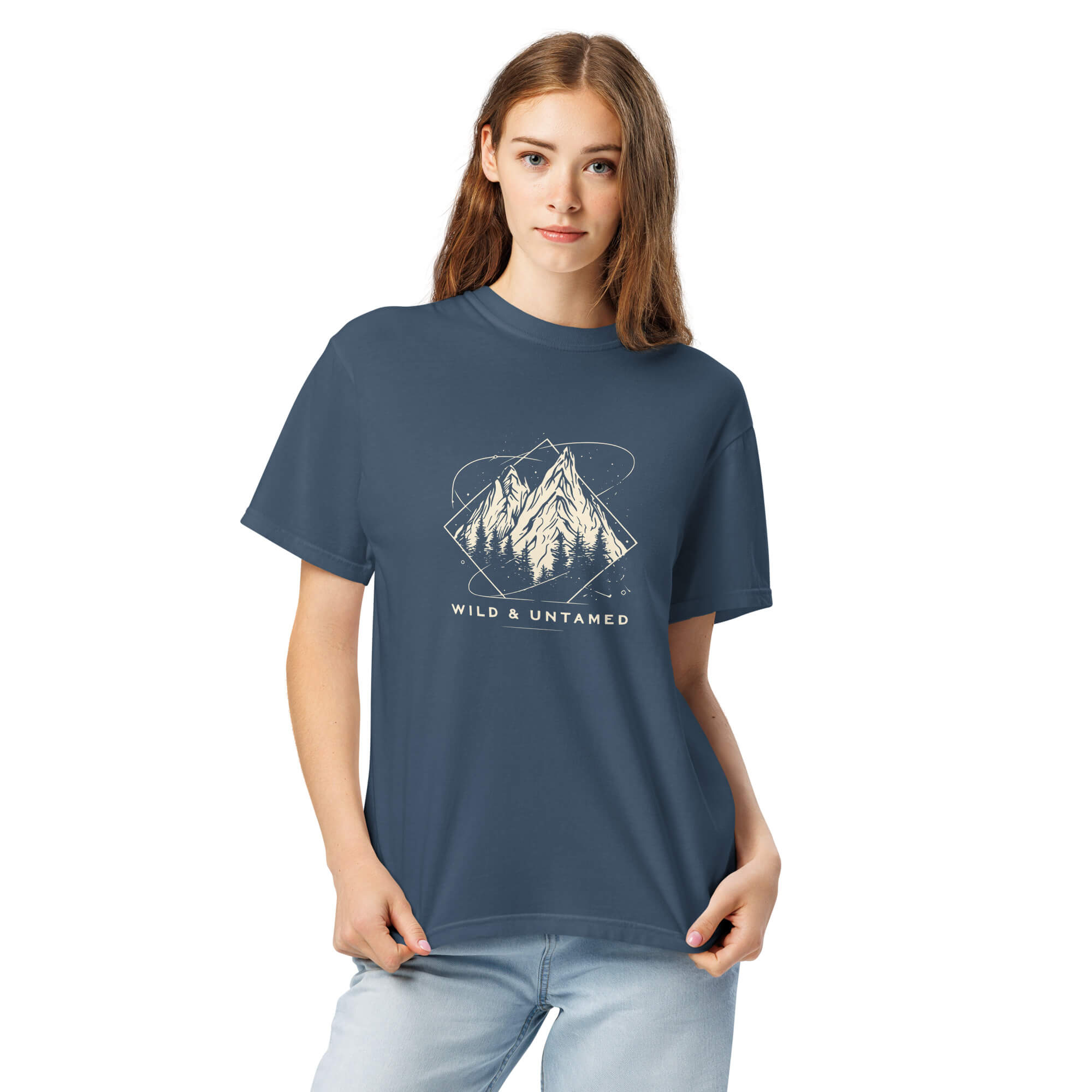 Mountain peaks and orbital rings design on a Midnight garment-dyed cotton t-shirt