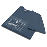 Running fox moonlit forest design on a Midnight garment-dyed cotton t-shirt