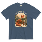 Fox in the snow Christmas design on a Midnight garment-dyed cotton t-shirt