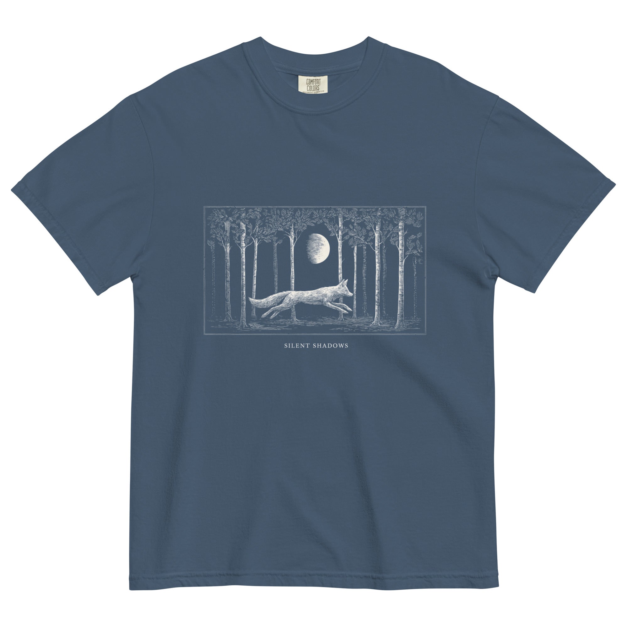 Running fox moonlit forest design on a Midnight garment-dyed cotton t-shirt