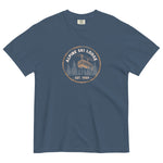 Alpine ski lodge gondola badge design on a Midnight garment-dyed cotton t-shirt
