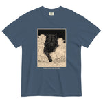 Black wolf in deep snow design on a Midnight garment-dyed cotton t-shirt