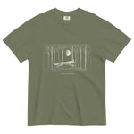Running fox moonlit forest design on a Moss garment-dyed cotton t-shirt