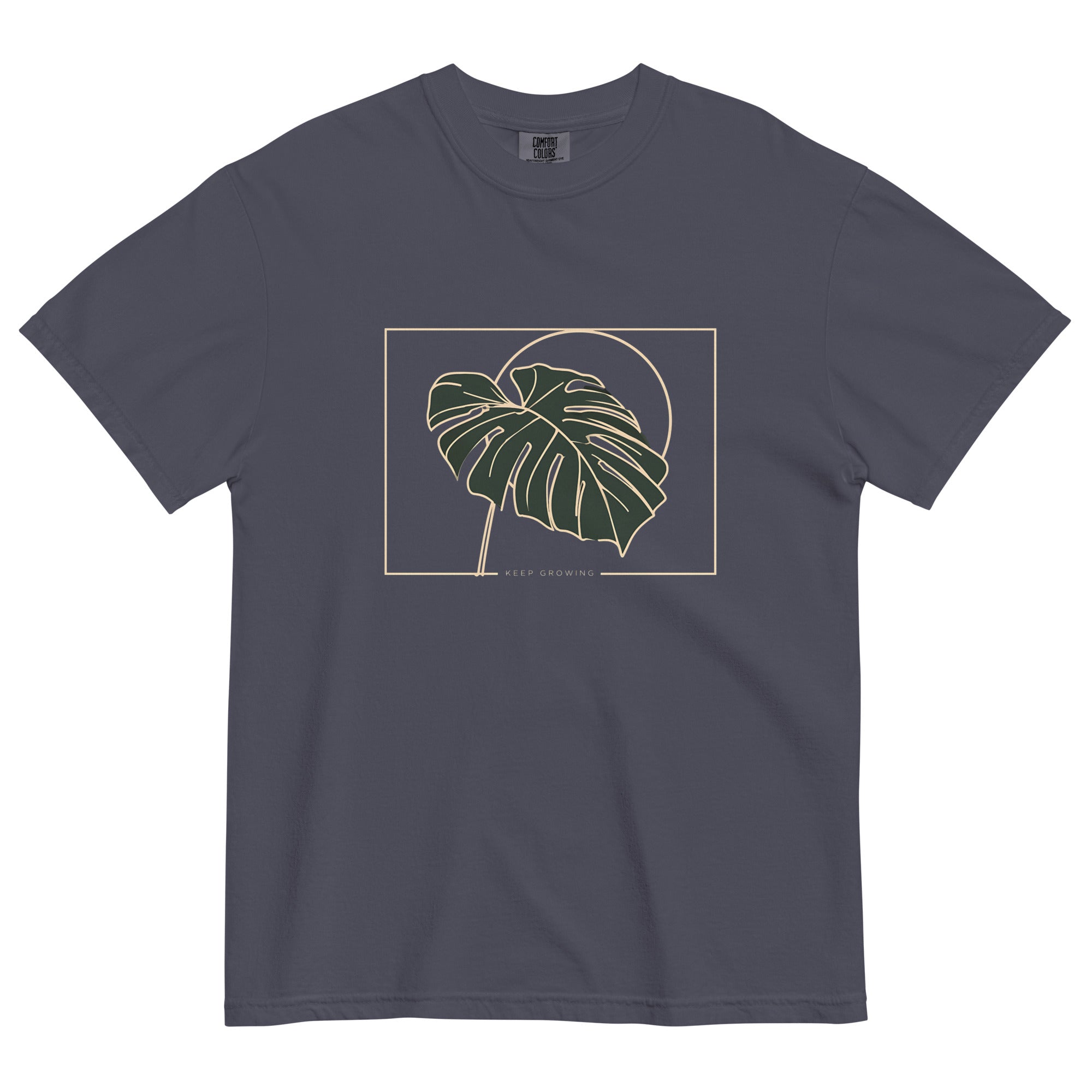 Monstera leaf design on a Navy garment-dyed cotton t-shirt