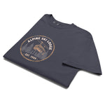 Alpine ski lodge gondola badge design on a Navy garment-dyed cotton t-shirt