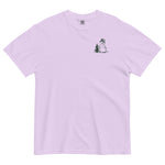 Snowman and pine tree design on an Orchid garment-dyed cotton t-shirt