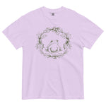 Frog in a holly wreath design on an Orchid garment-dyed cotton t-shirt