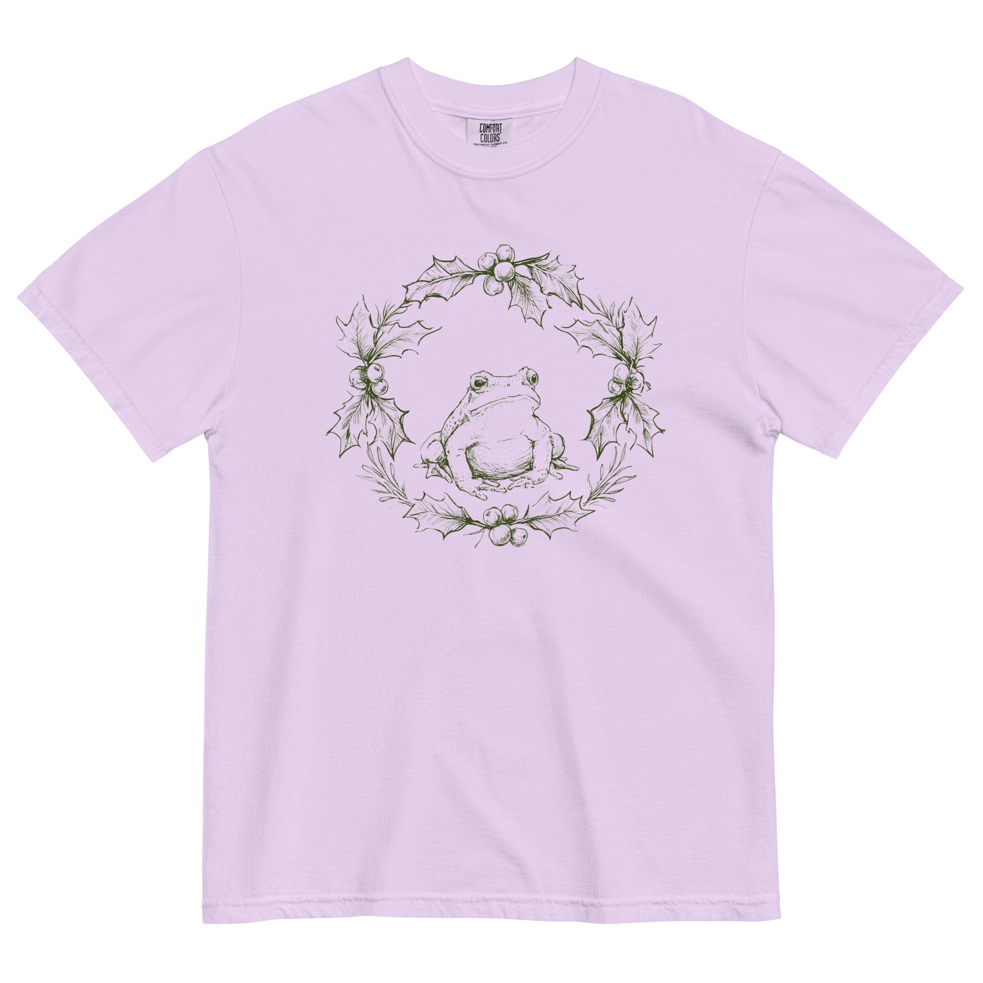 Frog in a holly wreath design on an Orchid garment-dyed cotton t-shirt