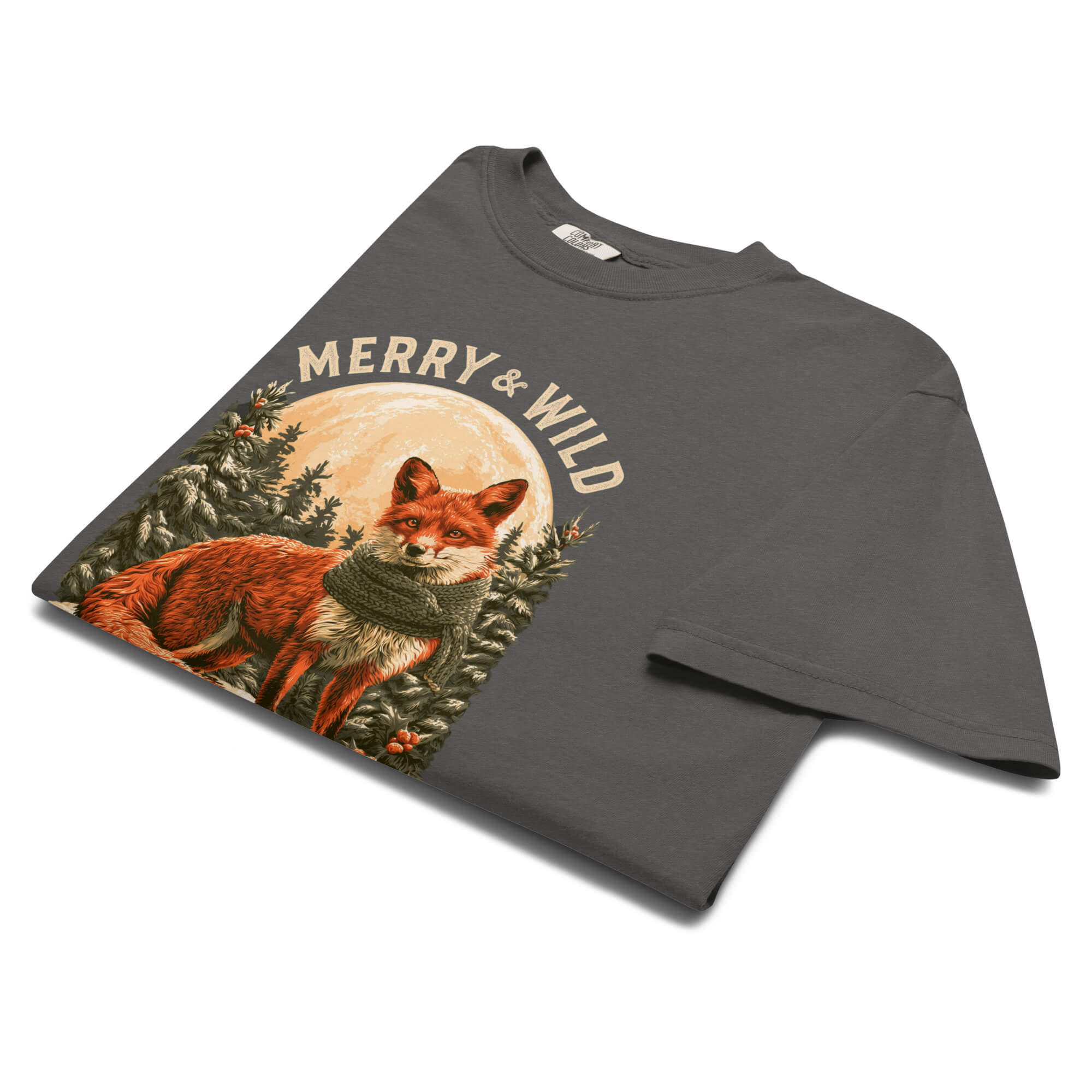 Fox in the snow Christmas design on a Pepper garment-dyed cotton t-shirt