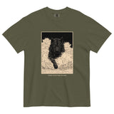Black wolf in deep snow design on a Sage garment-dyed cotton t-shirt