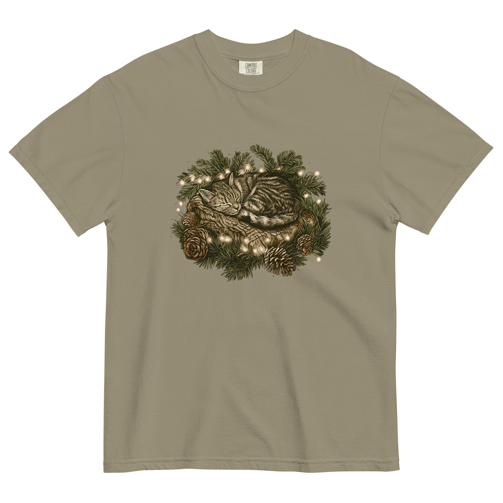 Kitten asleep in a Christmas wreath design on a Sandstone garment-dyed cotton t-shirt