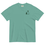 Snowman and pine tree design on a Seafoam garment-dyed cotton t-shirt