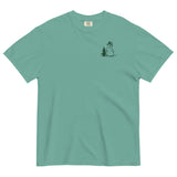 Snowman and pine tree design on a Seafoam garment-dyed cotton t-shirt