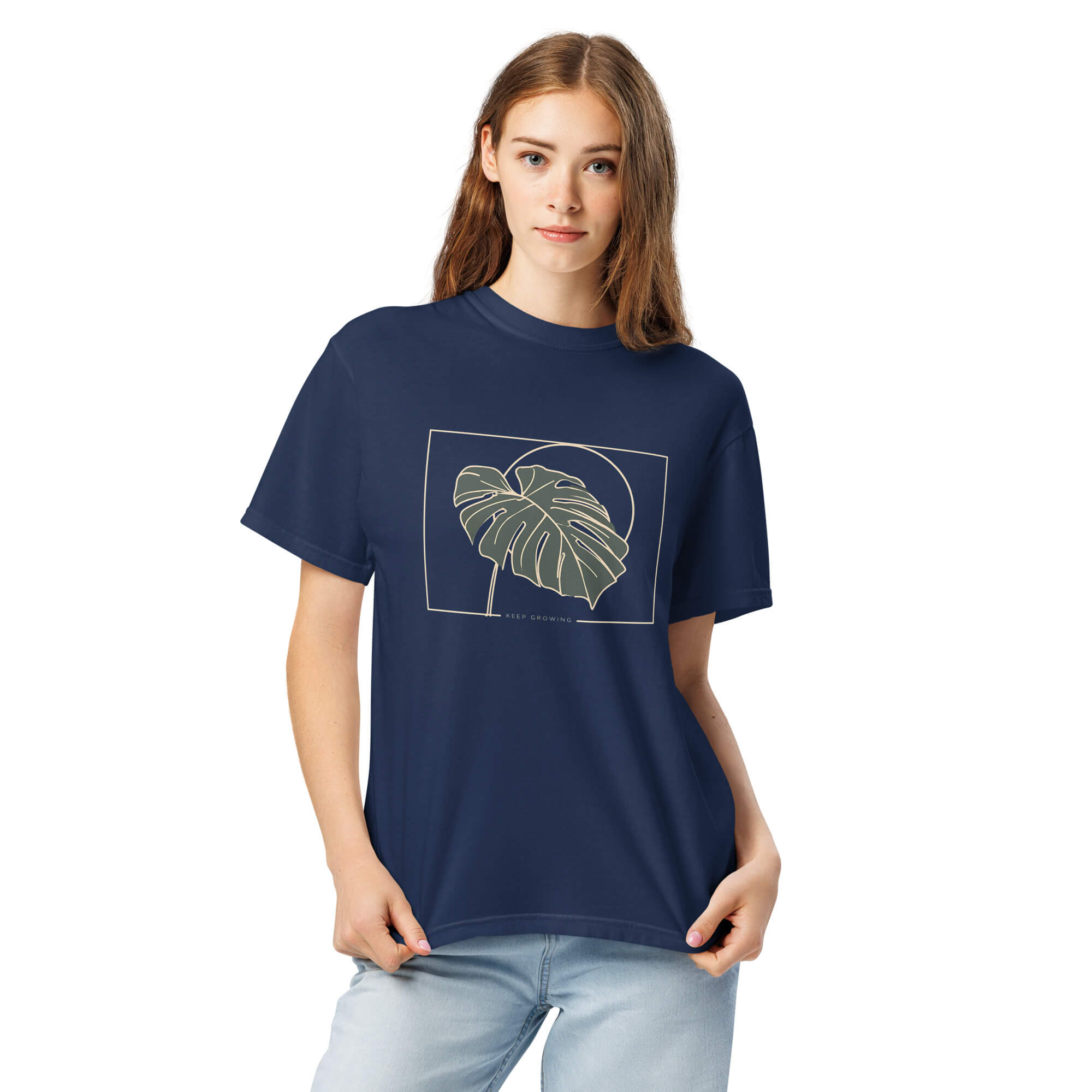 Monstera leaf design on a True Navy garment-dyed cotton t-shirt