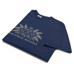 Nocturnal Botanics fern and flower design on a True Navy garment-dyed cotton t-shirt