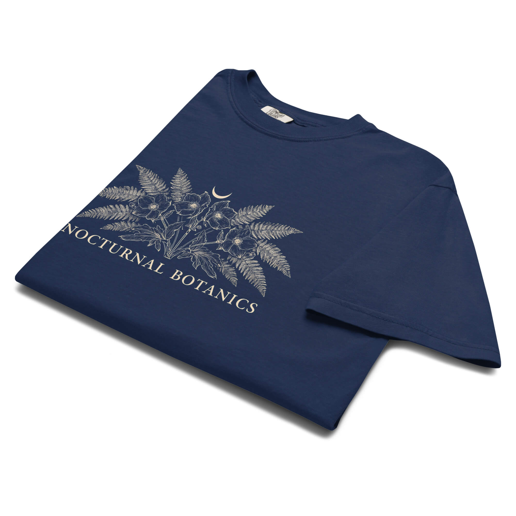 Nocturnal Botanics fern and flower design on a True Navy garment-dyed cotton t-shirt