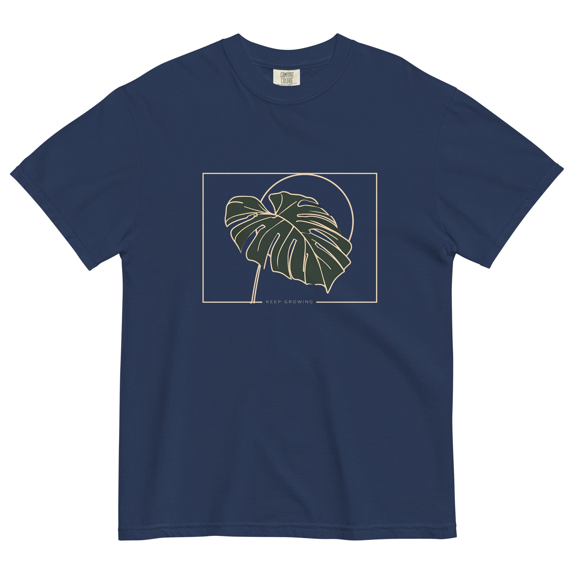 Monstera leaf design on a True Navy garment-dyed cotton t-shirt