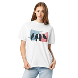 Birds on a wire design on a White garment-dyed cotton t-shirt