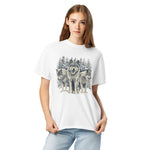 Three wolves in the snow design on a White garment-dyed cotton t-shirt