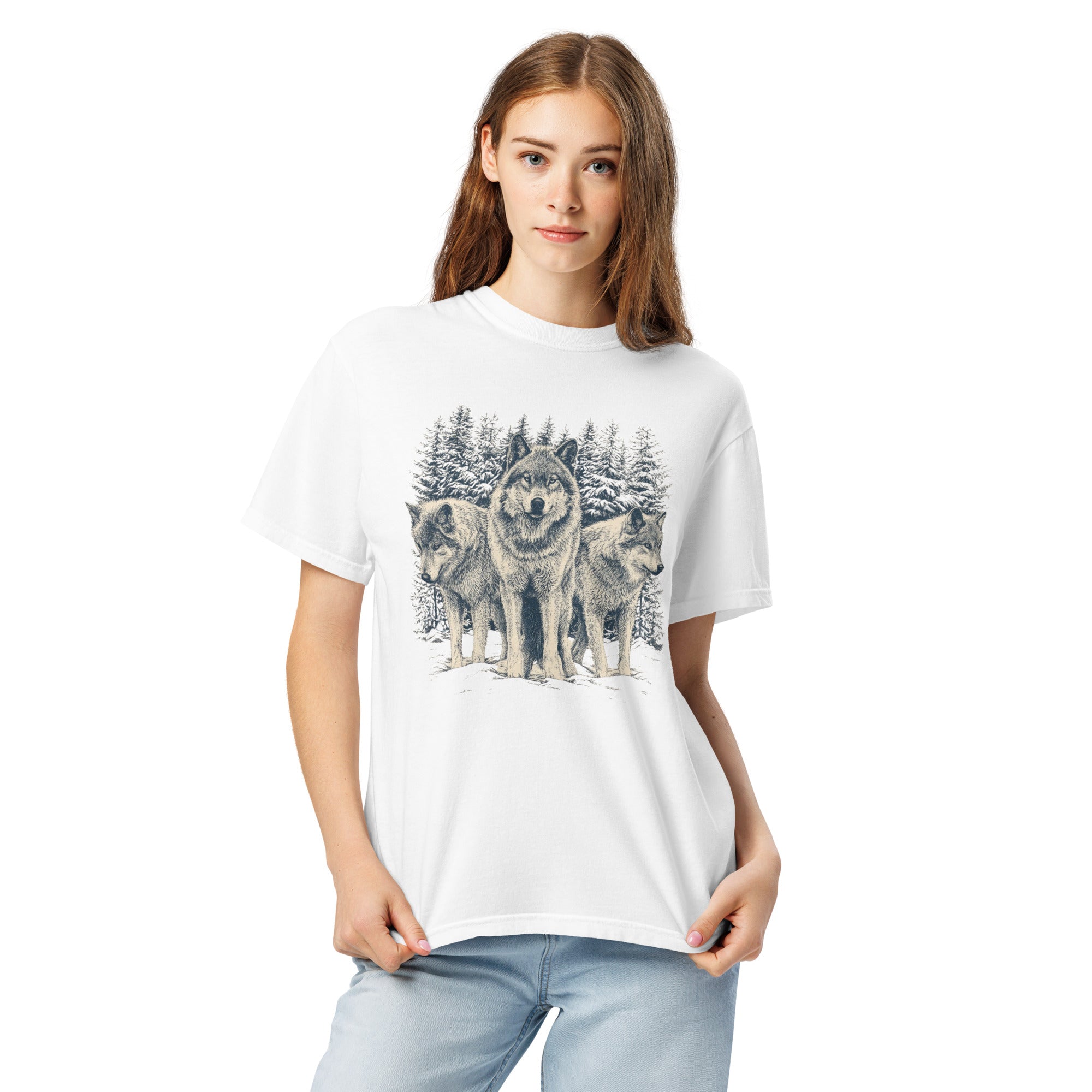 Three wolves in the snow design on a White garment-dyed cotton t-shirt