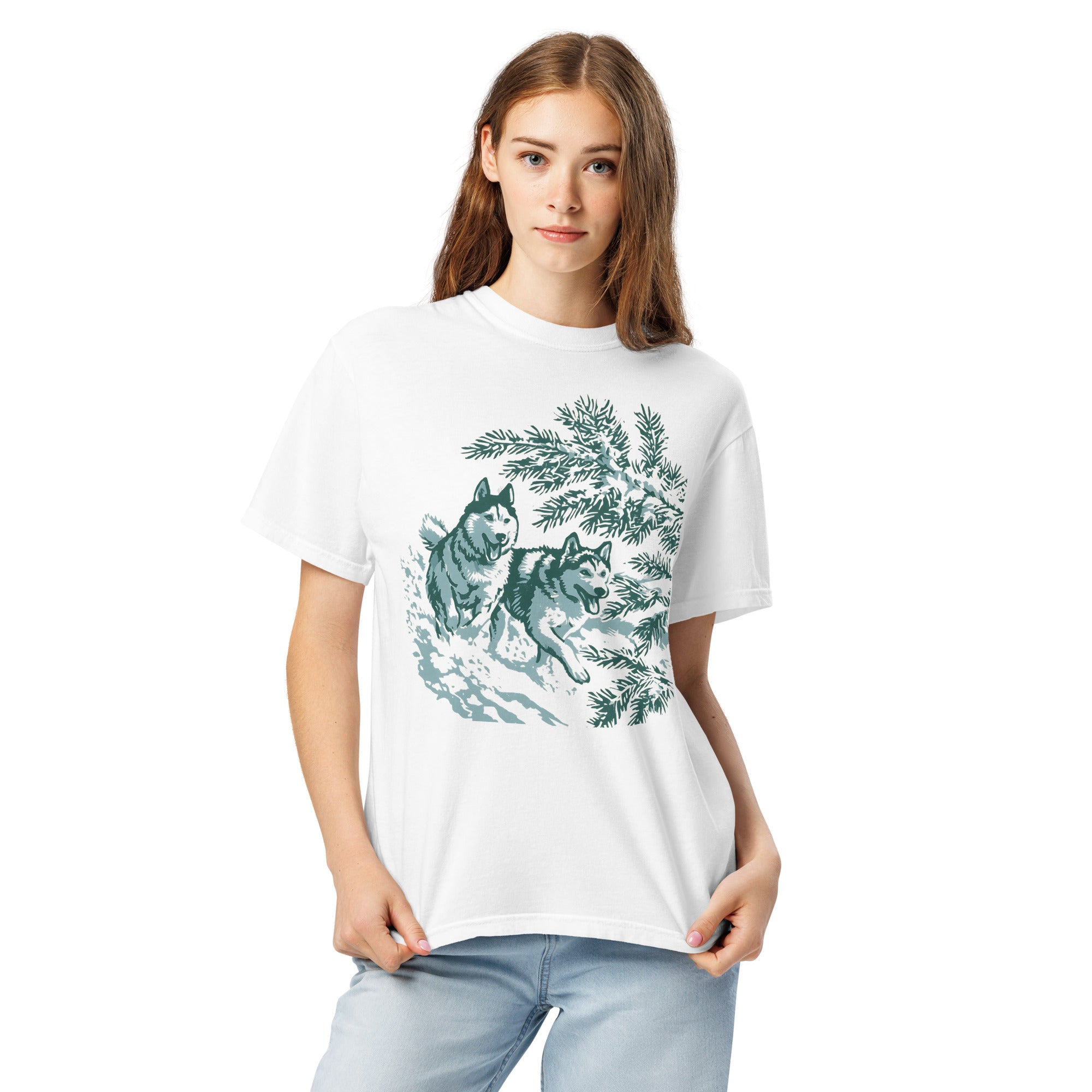 Huskies running in the snow design on a White garment-dyed cotton t-shirt