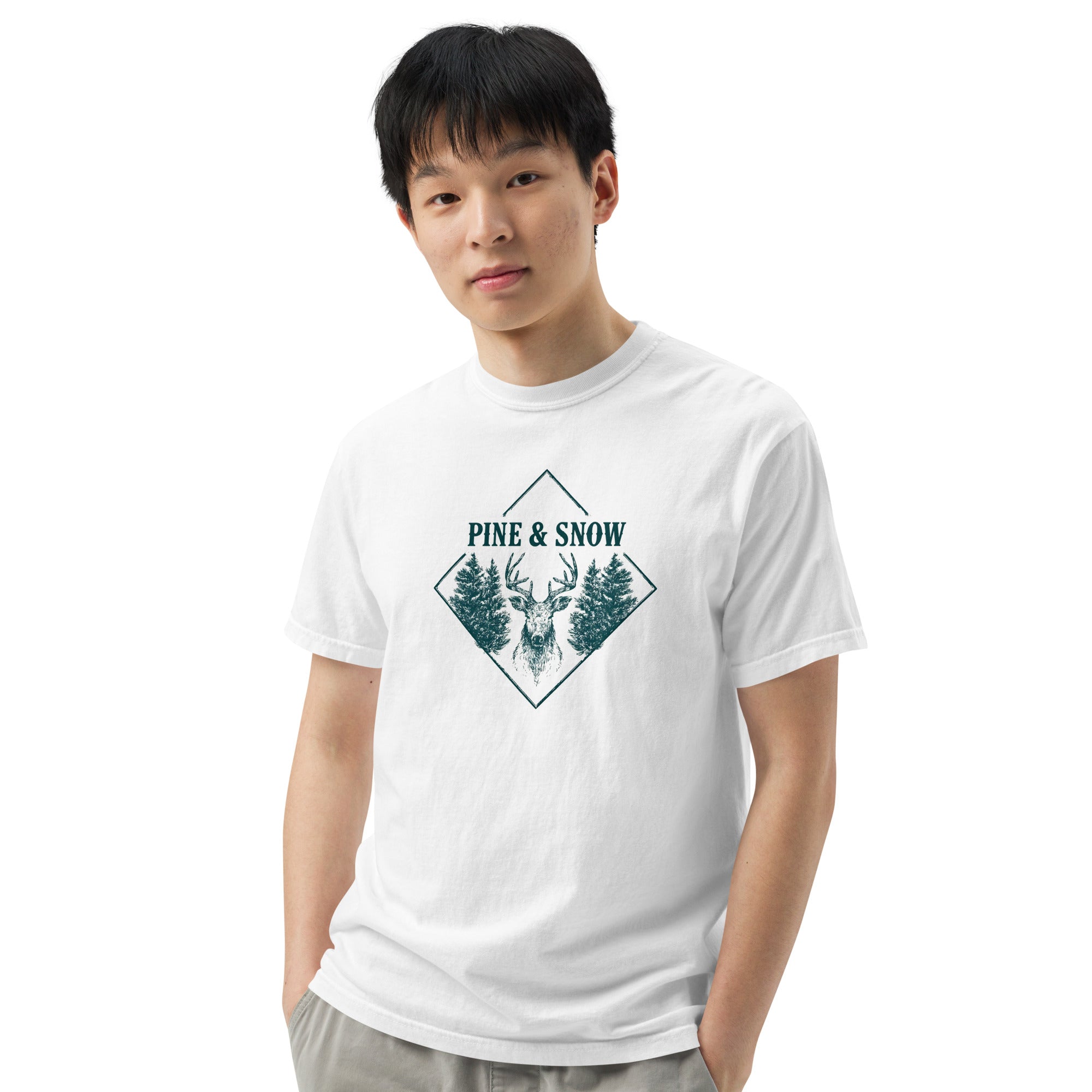 Stag emblem with pine and snow design on a White garment-dyed cotton t-shirt