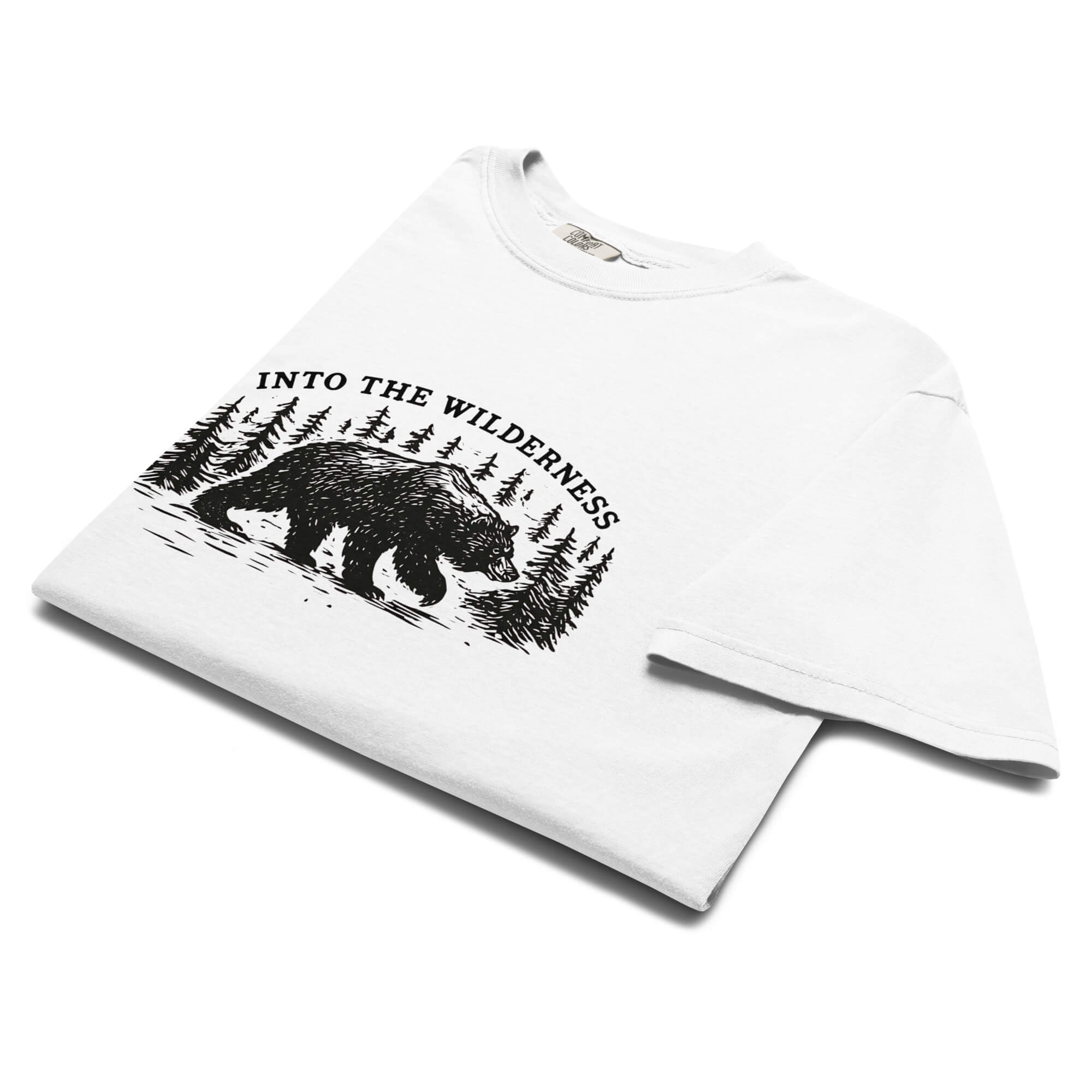 Bear and pine forest wilderness design on a White garment-dyed cotton t-shirt