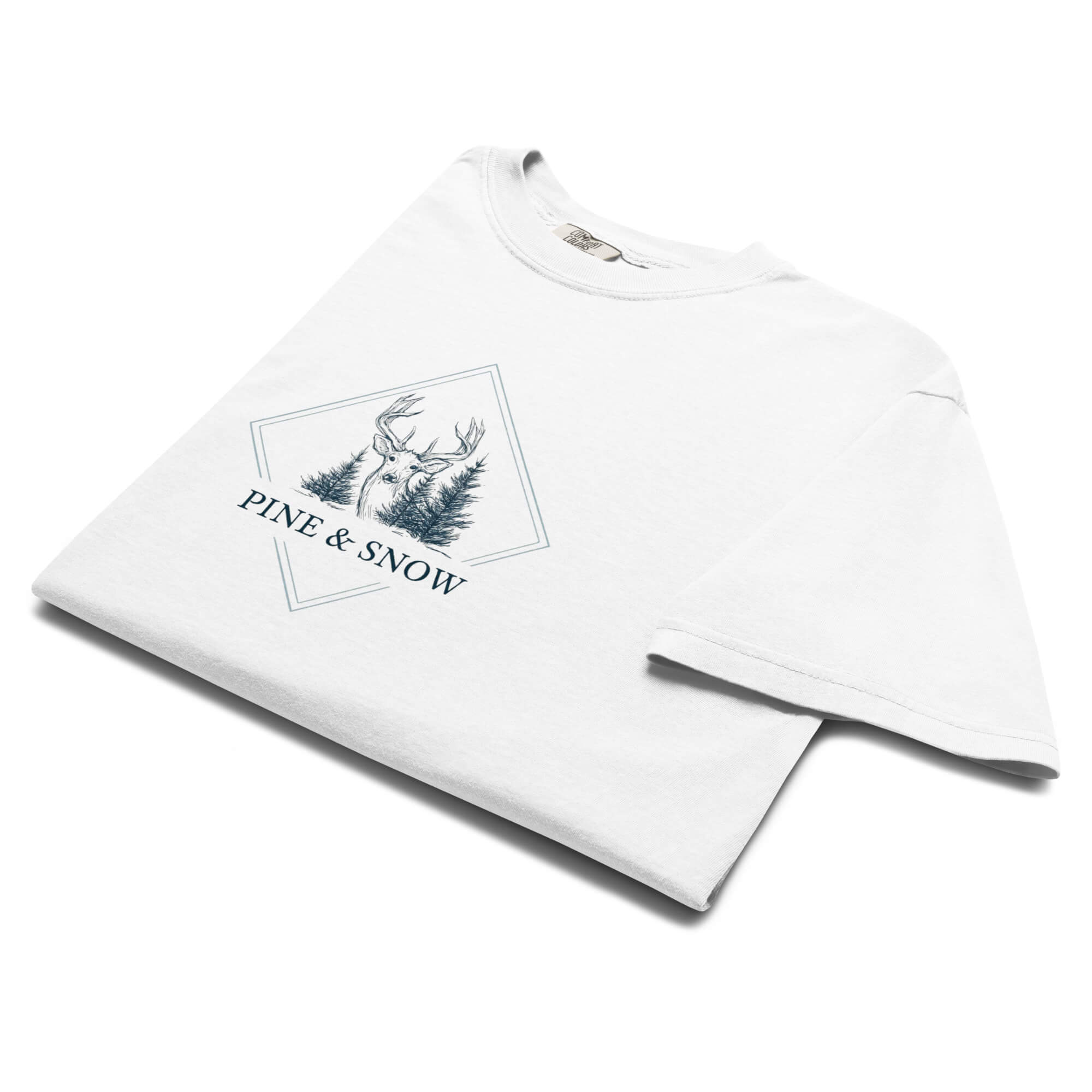 Deer and winter forest design on a White garment-dyed cotton t-shirt