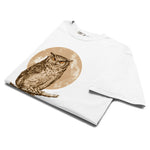 Great horned owl and moon design on a White garment-dyed cotton t-shirt