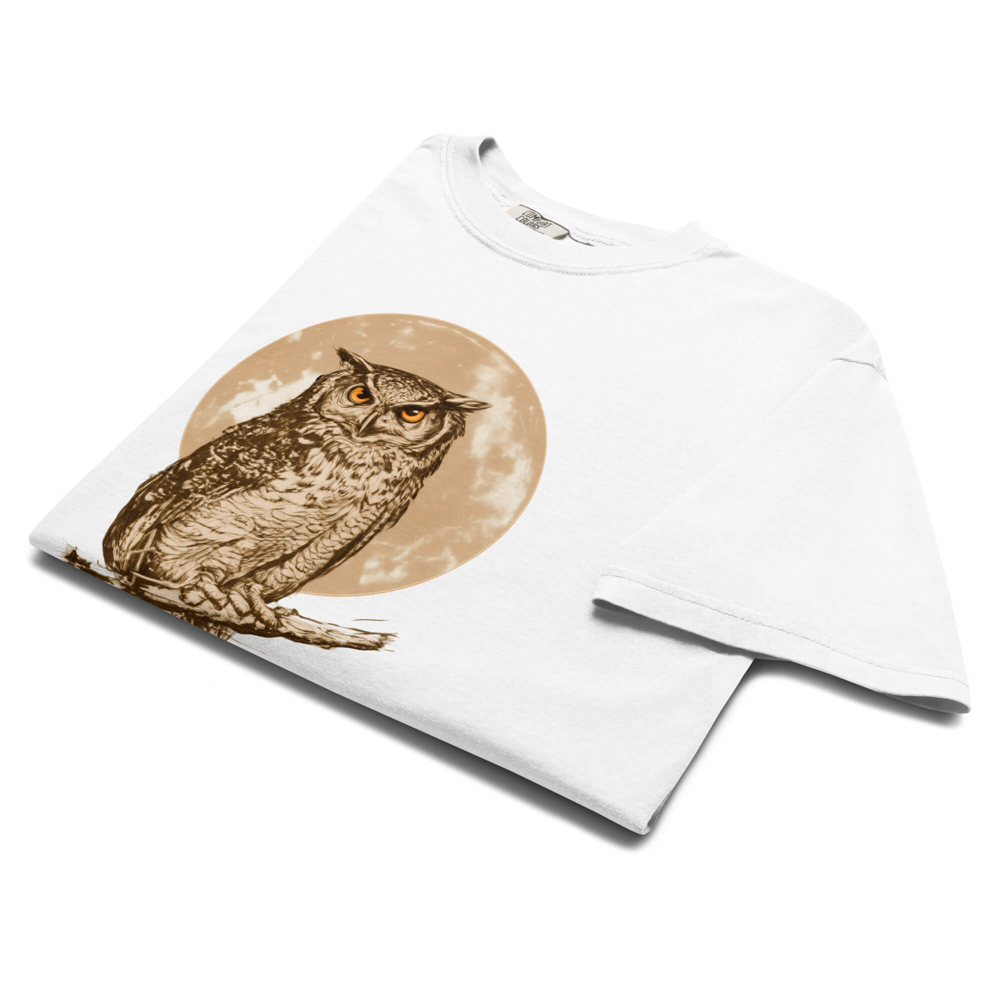 Great horned owl and moon design on a White garment-dyed cotton t-shirt