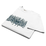 Moose in the winter woods design on a White garment-dyed cotton t-shirt