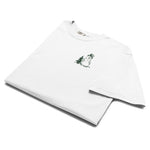 Snowman and pine tree design on a White garment-dyed cotton t-shirt