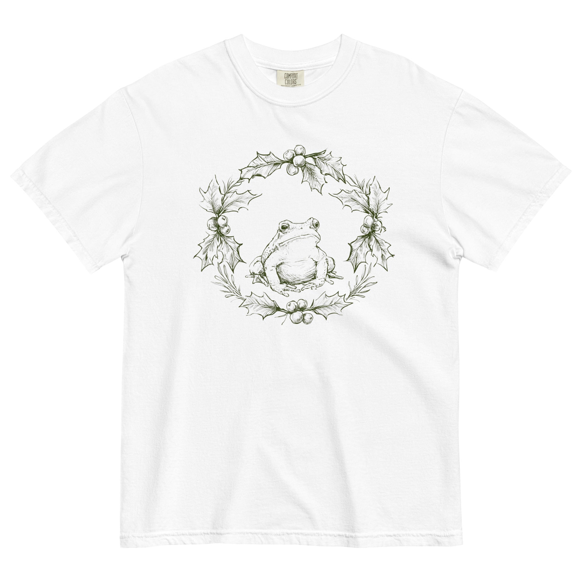 Frog in a holly wreath design on a White garment-dyed cotton t-shirt