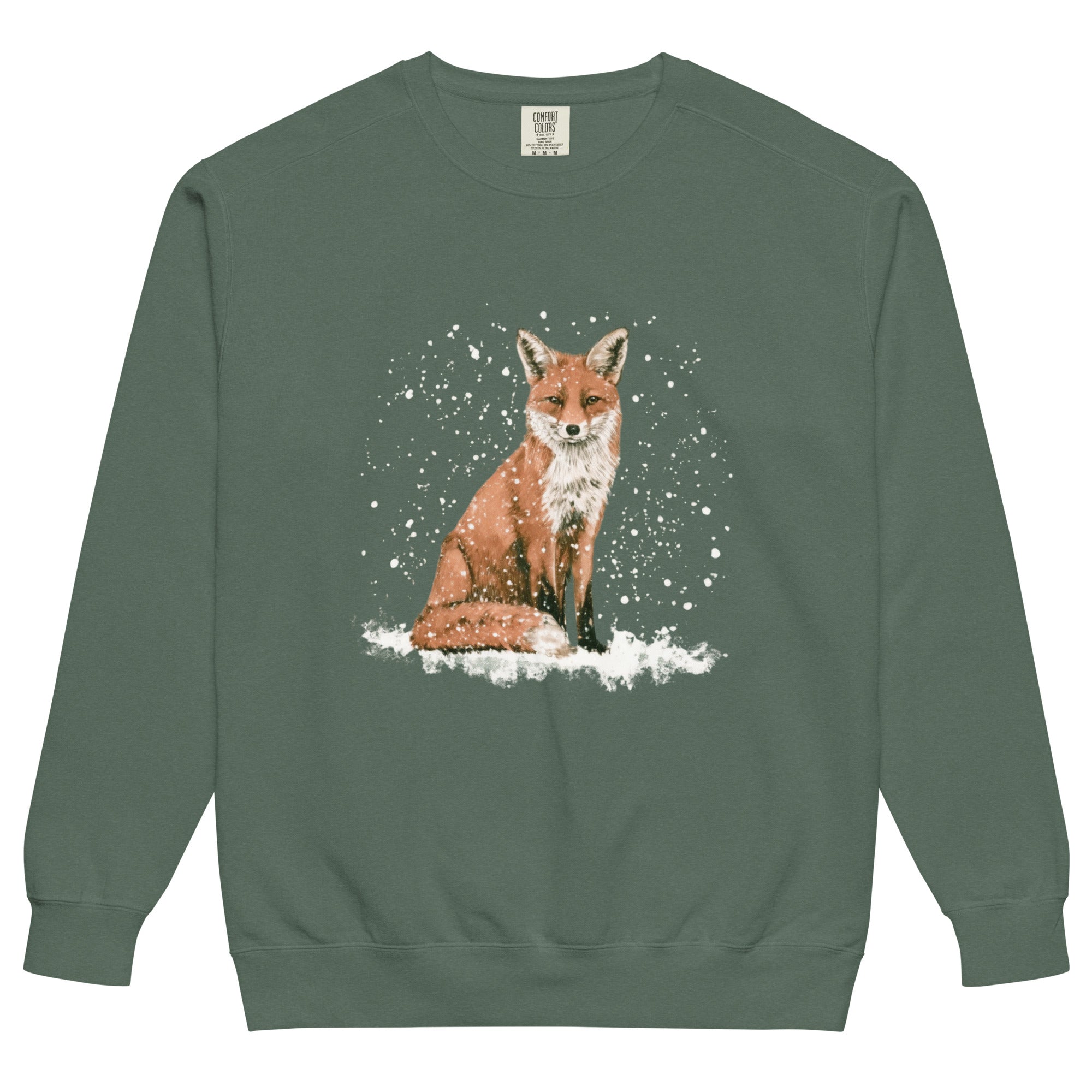 Red fox sitting in the snow design on a Blue Spruce garment-dyed sweatshirt