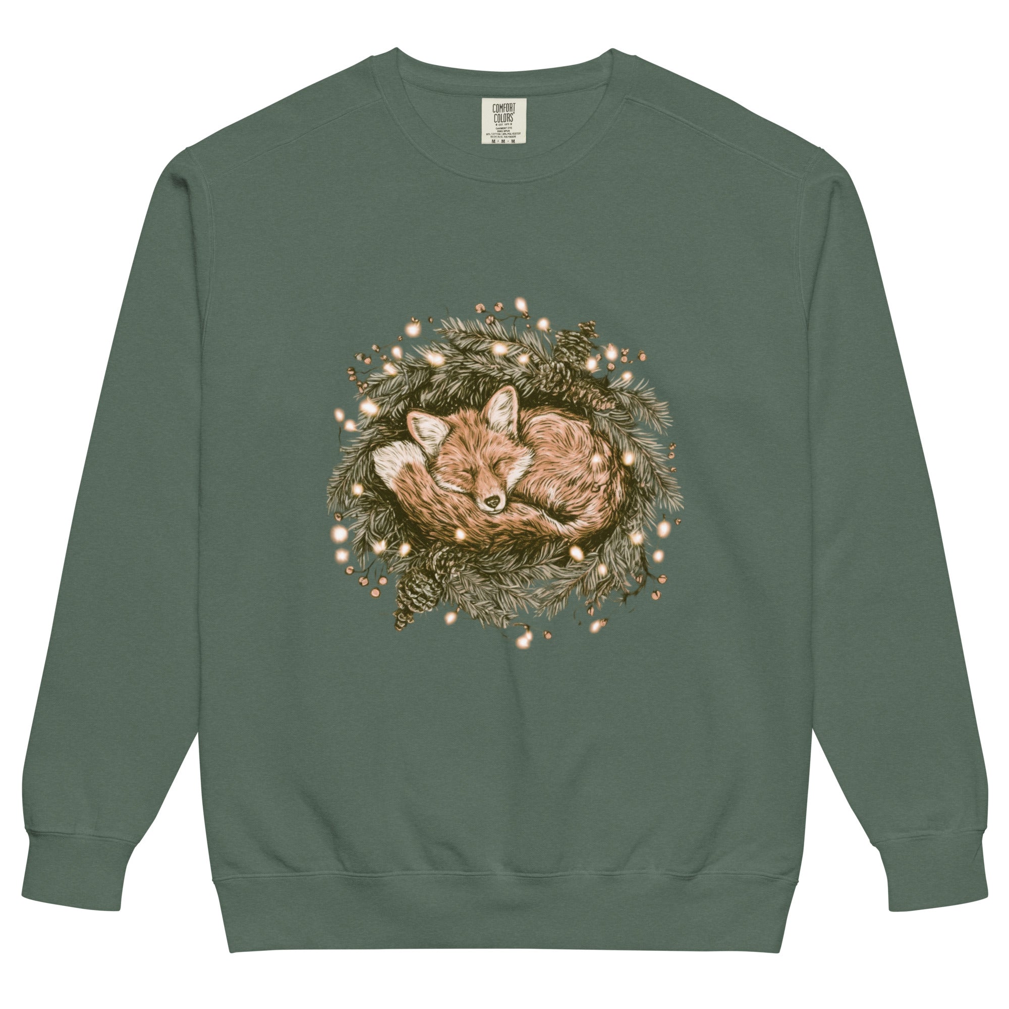 Fox asleep in a Christmas wreath design on a Blue Spruce garment-dyed sweatshirt